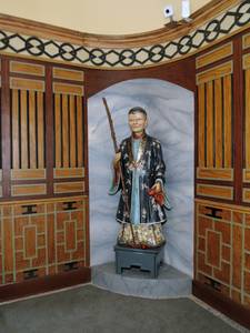 Rekonstruierte Nickfigur aufgestellt im Chinesischen Teehaus