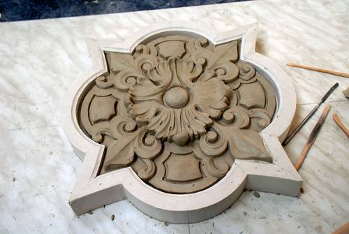 Reconstruction cross, rose, build up in clay
